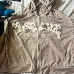 Beige Zip-Up Hoodie with Embroidered Design